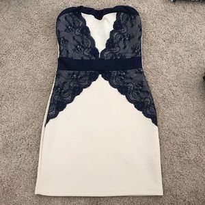 Bodycon beige and navy dress with lace detailing